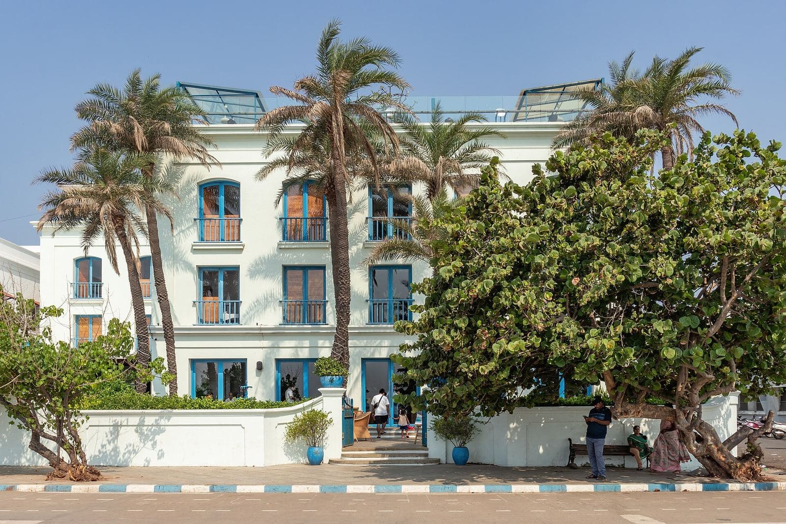 Colonial building with palms in Puducherry